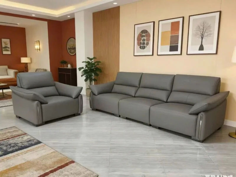 Toàn cảnh bộ sofa băng điện SF-B8179-13 màu xám đậm, bao gồm một ghế đơn và một băng ba chỗ, được chụp chính diện trong tr…