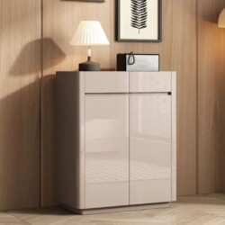 Tủ giầy TD6201 hiện đại, màu be sáng bóng, chụp chính diện trong không gian tiền sảnh. Tủ có một ngăn kéo nhỏ phía trên và…