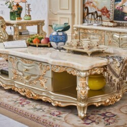 Bàn trà mặt đá tự nhiên BT802-16 phong cách tân cổ điển, chụp chính diện trong không gian phòng khách sang trọng. Bàn có m…