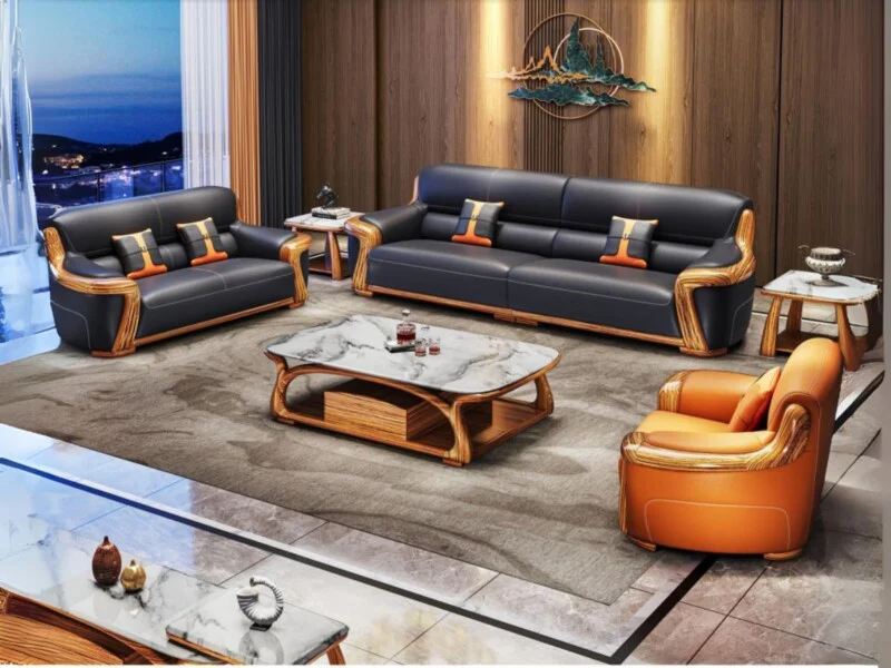 Toàn cảnh bộ sofa gỗ mun SBF623-124 màu đen và cam, gồm một băng dài, một băng đôi, một ghế đơn, bàn trà mặt đá và hai bàn…