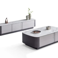 Bộ bàn trà và kệ tivi BTK6101-14KT được chụp từ góc chếch phía trước, nổi bật trên nền trắng. Bàn trà hình chữ nhật bo trò…