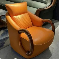 Ghế thư giãn Gỗ Mun GTW2101-1 được chụp từ góc hơi chếch phía trước, làm nổi bật kiểu dáng hiện đại với đường cong mềm mại…