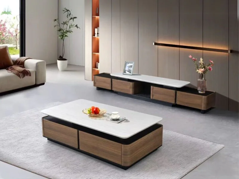 Bộ bàn trà và kệ tivi phong cách hiện đại, nhìn từ góc chính diện trong không gian phòng khách sang trọng. Bàn trà hình ch…