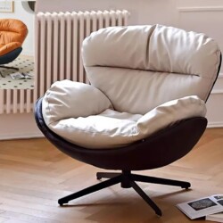 Ghế thư giãn GK01TG phong cách hiện đại, chụp chính diện trong không gian phòng khách tối giản. Ghế có phần vỏ ngoài màu n…