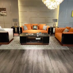 Toàn cảnh bộ sofa Luxury SFGD16-123 màu nâu cam đặt trong phòng khách sang trọng. Gồm một băng dài, một băng đôi, một ghế…