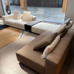 Bộ sofa góc trái SF2201-1 phong cách Ý được chụp từ góc cao, tập trung vào phần góc chữ L. Ghế có một phần chaiselongue bọ…