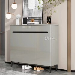 Tủ giày hiện đại TDA-120 được chụp chính diện, đặt trong không gian tiền sảnh hoặc lối vào nhà. Tủ có thiết kế tối giản vớ…