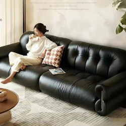 Sofa băng SF-HY03 màu đen được chụp từ góc hơi chếch phía trước, làm nổi bật toàn bộ chiều dài và thiết kế hiện đại. Sofa…