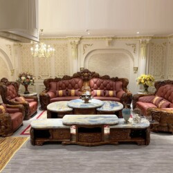 Toàn cảnh bộ sofa gỗ Mun tân cổ điển trong phòng khách sang trọng, góc chụp rộng từ phía trước. Các băng ghế và ghế đơn bọ…