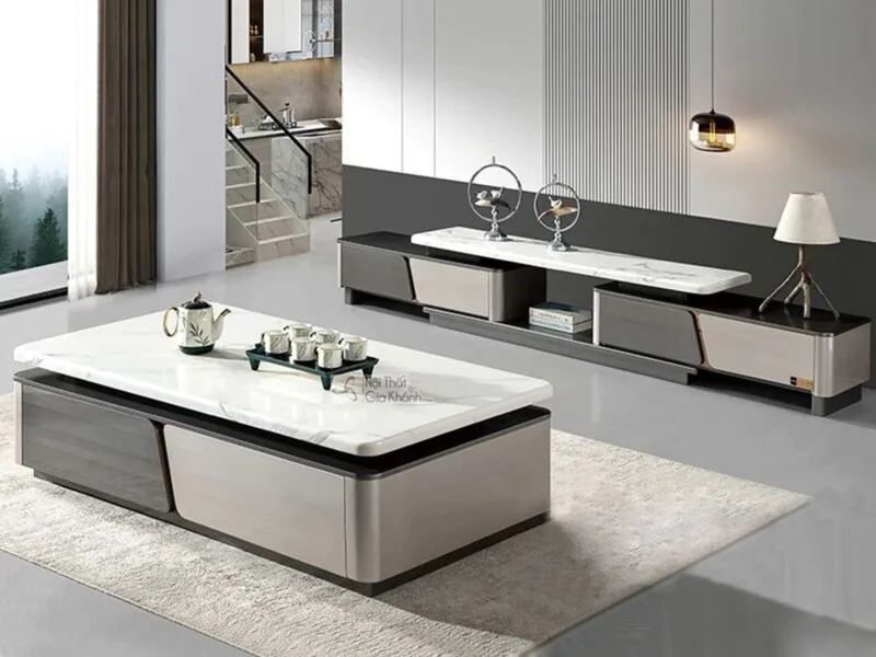 Ảnh chụp từ trên cao xuống một góc phòng khách hiện đại, trưng bày bộ bàn trà và kệ tivi BT1800-2800. Bàn trà hình chữ nhậ…