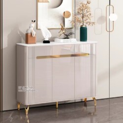 Tủ giày hiện đại TDEH166 được chụp chính diện, hơi chếch sang phải, đặt trong không gian sảnh hoặc phòng khách. Tủ có ba c…