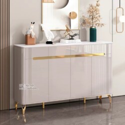 Tủ giày hiện đại TDEH168 được chụp chính diện, nổi bật với tông màu trắng kem bóng sang trọng. Mặt trên của tủ ốp đá vân t…