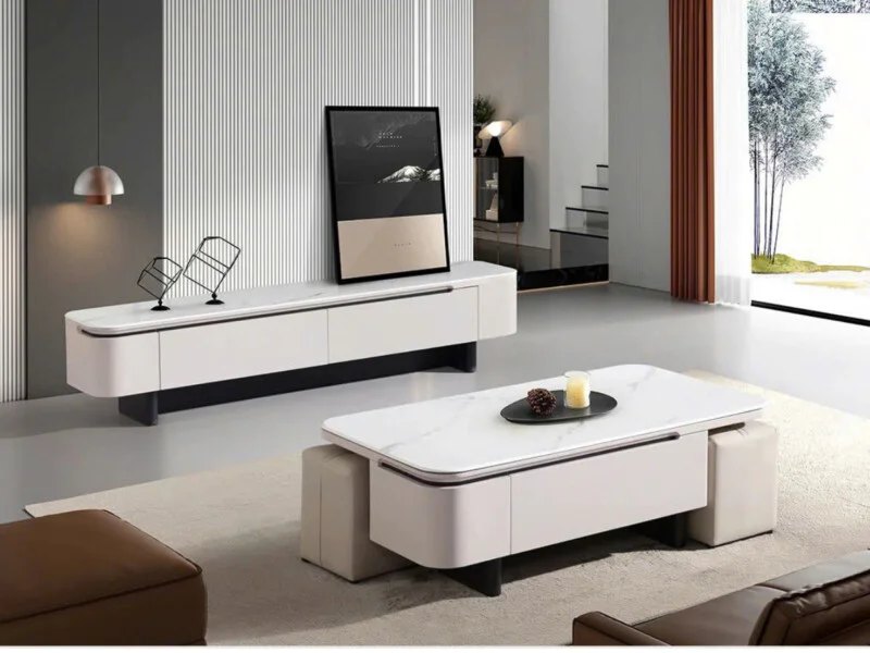 Kệ tivi hiện đại KT2517A-20 và bàn trà đồng bộ được chụp từ góc hơi chếch, đặt trong không gian phòng khách sang trọng. Kệ…
