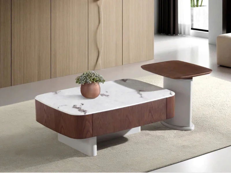 Bàn trà đôi XJ24180B/2503 phong cách hiện đại, chụp từ góc hơi chếch phía trước, đặt trên thảm màu be trong không gian phò…