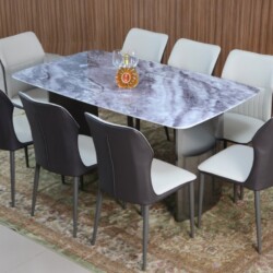 Bộ bàn ăn hiện đại BA6385-16 gồm bàn mặt đá pha lê nhân tạo màu vân mây xám trắng và 8 ghế ăn. Bốn ghế bọc da màu nâu đậm…