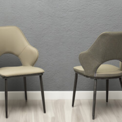 Hai ghế ăn hiện đại GAA370 đặt cạnh nhau trên nền xám đơn giản, một ghế màu be trơn và một ghế màu xám bọc da nhân tạo vân…