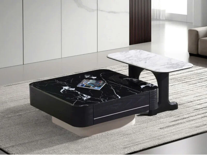 Cặp bàn trà đôi KT2501 phong cách hiện đại, đặt trên thảm lông màu xám nhạt trong không gian phòng khách tối giản. Bàn lớn…