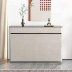 Tủ giầy hiện đại TDY204 được chụp chính diện, nổi bật với thiết kế tối giản, gồm bốn cánh tủ màu trắng kem và hai ngăn kéo…