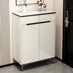 Tủ giầy TDHB80 hiện đại, chụp chính diện, đặt cạnh cửa ra vào. Tủ có hai cánh mở và một ngăn kéo phía trên, bề mặt phủ sơn…