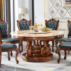Bộ bàn ăn tròn tân cổ điển BAGK01-18 gồm bàn mặt đá cẩm thạch tự nhiên màu be vân mây và 6 ghế bọc da xanh đậm, chụp chính…