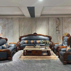 Bộ sofa gỗ Mun vương giả SF03-1124 chụp chính diện, trưng bày trong phòng khách cổ điển. Bộ gồm sofa băng dài, hai sofa đơ…