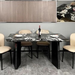 Bàn ăn mặt đá hiện đại BA803-18 được chụp chính diện, đặt trong không gian phòng ăn tối giản với tường màu xám và tủ gỗ. M…
