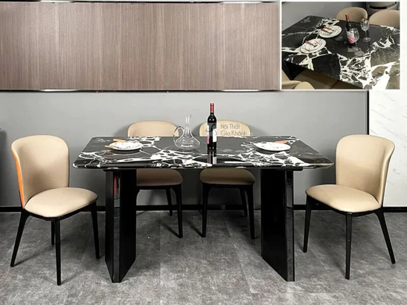 Bàn ăn mặt đá hiện đại BA803-18 được chụp chính diện, đặt trong không gian phòng ăn tối giản với tường màu xám và tủ gỗ. M…