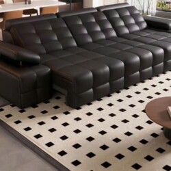 Sofa băng chỉnh điện SF64-31 màu đen tuyền, bọc da bò tự nhiên, được chụp từ góc nhìn hơi cao xuống, đặt trong không gian…