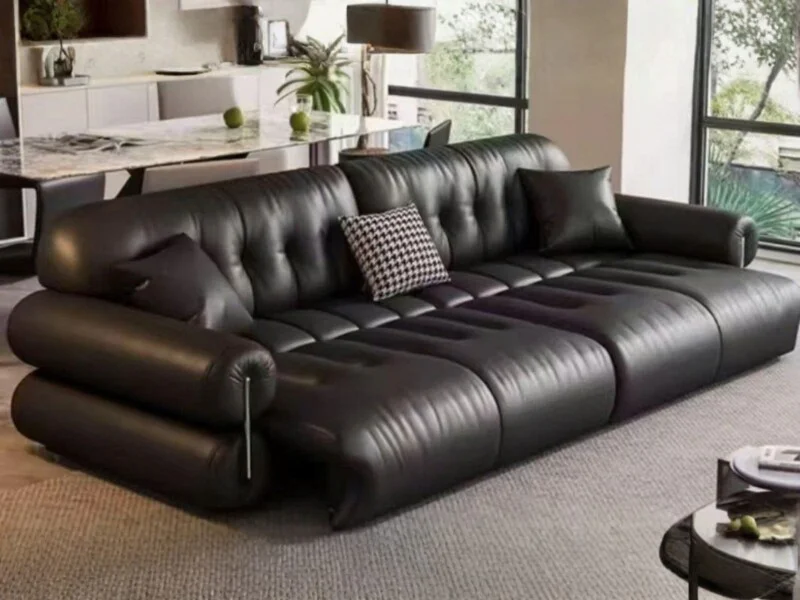 Chiếc sofa chỉnh điện SF-HY08 màu đen sang trọng, được chụp từ góc hơi chếch, nổi bật kiểu dáng góc chữ L hiện đại với các…