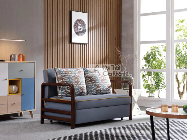 Sofa giường SF1012A-1 được chụp chính diện trong trạng thái ghế ngồi, đặt trong không gian phòng khách hiện đại. Ghế có kh…