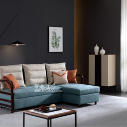 Ghế sofa góc kiêm giường ngủ thông minh SF273B-2G màu xanh ngọc bích, đặt trong không gian phòng khách hiện đại. Sofa có t…