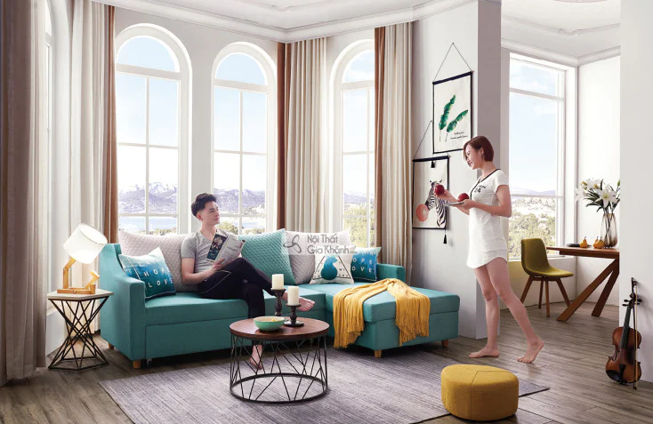 Bộ sofa góc đa năng SF258-1F màu xanh ngọc bích được đặt trong không gian phòng khách hiện đại, sáng sủa. Góc chụp toàn cả…