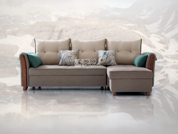 Sofa giường đa năng SF276-2G góc phải được chụp chính diện, nổi bật với tông màu be chủ đạo của vải bọc. Sofa có ba gối tự…