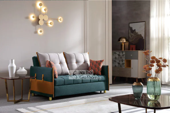 Sofa kiêm giường ngủ đa năng SF272A-5G được chụp từ góc chính diện hơi chếch, nổi bật với tông màu xanh ngọc bích chủ đạo…