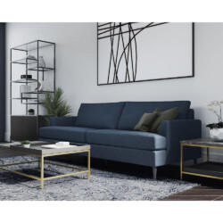 Sofa băng bọc vải màu xanh đậm nổi bật trong không gian phòng khách hiện đại. Sofa có thiết kế tay vịn thấp, đệm ngồi và t…