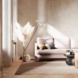 Sofa văng Abbe SF-429 màu hồng nhạt, chụp từ góc thấp, nhìn thấy toàn bộ chiều dài sofa. Sofa được đặt trên thảm dệt màu b…