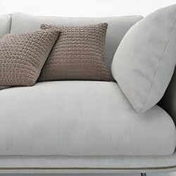 Chi tiết tay vịn và đệm ngồi của sofa Joeerly SF-329, cho thấy chất liệu vải bọc màu xám nhạt với đường viền tinh tế. Gối…