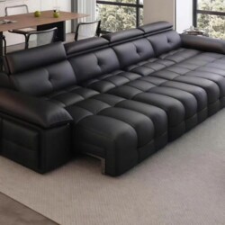 Chiếc sofa băng chỉnh điện SF197 màu đen sang trọng, được chụp từ góc nhìn trên cao hơi chếch, cho thấy toàn bộ chiều dài…