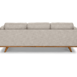 Sofa băng 3 chỗ chụp từ phía sau, thể hiện sự liền mạch của lưng tựa và tay vịn. Lớp vải bọc màu be nhạt cùng khung gỗ tự…