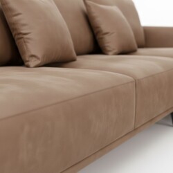 Cận cảnh bề mặt da nhân tạo cao cấp màu nâu be của sofa, thể hiện rõ chất liệu mềm mại và đường may thẳng tắp, chắc chắn…