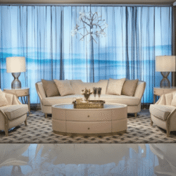 Toàn cảnh bộ sofa Phong Cách Mỹ SFM808-113 màu be nhạt, đặt trong phòng khách sang trọng với sàn đá bóng loáng và rèm cửa…