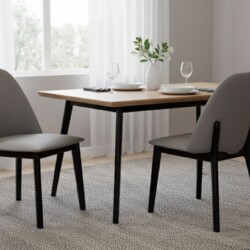 Cặp ghế ăn hiện đại GA888 màu xám được bố trí trong một không gian phòng ăn ấm cúng, cạnh bàn ăn mặt gỗ chân đen. Ghế có t…