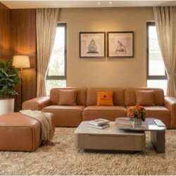 Sofa băng SFA38-32 và đôn được chụp từ góc nhìn cận cảnh hơn, làm nổi bật đường may tinh tế và chất liệu da bò mềm mại màu…