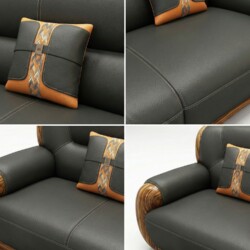 Cận cảnh bề mặt da bọc sofa màu xám đậm và gối tựa lưng nhỏ màu nâu cam với họa tiết trang trí độc đáo. Đường may tinh xảo…
