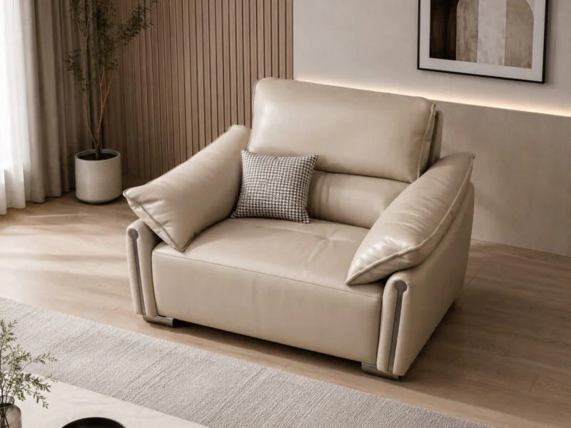 Sofa đơn COCOON SB8179 nhìn từ góc trên, có gối tựa nhỏ màu xám đặt trên đệm lưng. Thiết kế hiện đại với tay vịn bo tròn m…